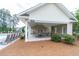 A community poolhouse with picnic tables, BBQ grills, and bathroom facilities at 138 Shadybrook Dr, Summerville, SC 29486