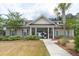 Pool house with ample seating and shady spots to relax with friends and neighbors at 138 Shadybrook Dr, Summerville, SC 29486