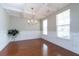 Elegant dining room with a chandelier, wainscoting, and large windows at 138 Shadybrook Dr, Summerville, SC 29486