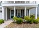 Inviting covered front porch, perfect for relaxing and enjoying the outdoors at 138 Shadybrook Dr, Summerville, SC 29486