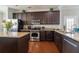 Well-equipped kitchen with stainless steel appliances, ample cabinet space, and granite countertops at 138 Shadybrook Dr, Summerville, SC 29486