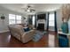 Spacious living room with hardwood floors, modern furnishings, and a bright, airy atmosphere at 138 Shadybrook Dr, Summerville, SC 29486
