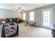 Spacious living room with a ceiling fan and neutral paint, perfect for Gathering gatherings at 138 Shadybrook Dr, Summerville, SC 29486