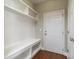Mudroom features coat hooks, bench and cubbies near the front door with tile floors at 138 Shadybrook Dr, Summerville, SC 29486