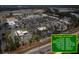 Aerial view of the shopping area of Cane Bay, featuring various stores, restaurants, and businesses at 138 Shadybrook Dr, Summerville, SC 29486