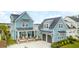 Aerial view of a beautifully landscaped home with a covered front porch, and a two-car garage at 141 Sandy Bend Ln, Summerville, SC 29486
