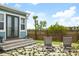 Backyard with lounge chairs and patio featuring steps up to the back door at 141 Sandy Bend Ln, Summerville, SC 29486