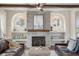Elegant fireplace with brick surround and decorative built-in shelving at 141 Sandy Bend Ln, Summerville, SC 29486
