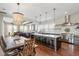 A gourmet kitchen boasts a central island, high-end appliances, and seamless flow to the dining and living areas at 141 Sandy Bend Ln, Summerville, SC 29486