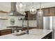 Gourmet kitchen with marble countertops, stainless steel appliances, and custom cabinets at 141 Sandy Bend Ln, Summerville, SC 29486