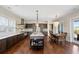 Spacious kitchen featuring a large island, modern lighting, and an adjacent dining area at 141 Sandy Bend Ln, Summerville, SC 29486
