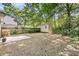 Large backyard featuring a storage shed with lots of green foliage at 1429 Swamp Fox Ln, Charleston, SC 29412