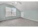 Bedroom with a vaulted ceiling, carpet, and a large window for ample light at 1429 Swamp Fox Ln, Charleston, SC 29412