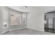 Bright dining room with new flooring and adjacent kitchen view at 1429 Swamp Fox Ln, Charleston, SC 29412