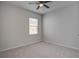 Bedroom features natural light from a large window and soft carpet at 143 West Bradford Pointe Dr, Summerville, SC 29486