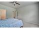 Comfortable bedroom with carpet flooring, and ceiling fan and two door entrances at 143 West Bradford Pointe Dr, Summerville, SC 29486
