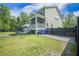 Charming two-story home with a screened porch and a spacious backyard at 1489 Brockenfelt Dr, Charleston, SC 29414