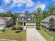 Attractive home with a well-maintained lawn and a classic two-story design at 1489 Brockenfelt Dr, Charleston, SC 29414