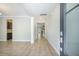 Open foyer showcasing tile flooring, neutral walls, and a view into the living spaces at 1489 Brockenfelt Dr, Charleston, SC 29414