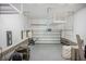 Spacious, organized garage with overhead storage racks and an epoxy-coated floor at 1489 Brockenfelt Dr, Charleston, SC 29414