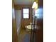 Compact bathroom with a shower, toilet, and a vessel sink at 1603 Lybrand St, Edisto Island, SC 29438