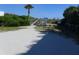 Wooden path leading to the beach, providing easy access for residents and visitors at 1603 Lybrand St, Edisto Island, SC 29438