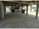 Carport with a parked truck, offering covered parking and storage space at 1603 Lybrand St, Edisto Island, SC 29438