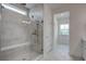 Luxurious shower with glass door and tiled walls, plus a view into the well-lit bathroom at 1619 Cultivation Ln, Mount Pleasant, SC 29466
