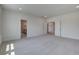 Large bedroom with neutral carpeting and access to bathroom and closet spaces at 1619 Cultivation Ln, Mount Pleasant, SC 29466