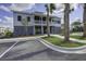 Beautiful community center with palm trees, lush landscaping, and ample parking at 1619 Cultivation Ln, Mount Pleasant, SC 29466