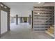 Spacious garage with finished concrete floors and stairs at 1619 Cultivation Ln, Mount Pleasant, SC 29466