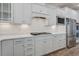 Spacious kitchen featuring stainless steel appliances, gas cooktop, and white cabinets at 1619 Cultivation Ln, Mount Pleasant, SC 29466