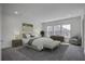 Serene bedroom with a neutral color palette, soft lighting, and elegant furniture creates a relaxing retreat at 1619 Cultivation Ln, Mount Pleasant, SC 29466