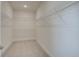Spacious walk-in closet with carpeted floor and metal shelving, offering ample storage at 1619 Cultivation Ln, Mount Pleasant, SC 29466