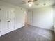 Spacious bedroom features plush carpeting, ample closet space, and neutral walls at 1622 Pin Oak Cut, Mount Pleasant, SC 29466
