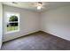 Bright bedroom featuring neutral walls, plush carpeting, and a window at 1622 Pin Oak Cut, Mount Pleasant, SC 29466