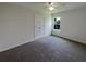 Comfortable bedroom featuring carpet, closet, ceiling fan, and natural light at 1622 Pin Oak Cut, Mount Pleasant, SC 29466