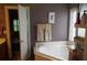 Bathroom with a deep soaking tub and neutral decor for a clean, calming feel at 1757 Wayah Dr, Charleston, SC 29414