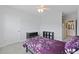Bright bedroom with white trim and a ceiling fan at 1984 Folly Rd # A307, Charleston, SC 29412