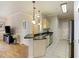 Kitchen features stainless steel appliances, granite counters, and a functional island at 1984 Folly Rd # A307, Charleston, SC 29412