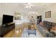 Spacious living room offers an open floor plan with views of the kitchen and dining area at 1984 Folly Rd # A307, Charleston, SC 29412