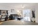 Spacious living room area featuring a large sofa, and bright, natural light at 1984 Folly Rd # A307, Charleston, SC 29412