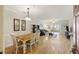 Open-concept living space featuring a dining area that flows into the living room, enhancing the home's bright atmosphere at 1984 Folly Rd # A307, Charleston, SC 29412