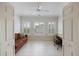 Inviting office space with neutral walls, a ceiling fan, and natural light from large windows at 1984 Folly Rd # A307, Charleston, SC 29412