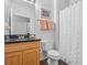 Clean bathroom featuring a vanity sink and shower with curtain at 1984 Folly Rd # B114, Charleston, SC 29412