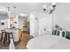 Eat-in kitchen with modern light fixtures, stainless steel appliances, and bar seating at 1984 Folly Rd # B114, Charleston, SC 29412