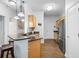 Charming kitchen with granite counters, wood cabinets, stainless steel appliances, and cozy lighting at 1984 Folly Rd # B114, Charleston, SC 29412