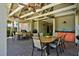 Outdoor kitchen and dining area under a covered patio, perfect for gatherings and dining at 1984 Folly Rd # B114, Charleston, SC 29412