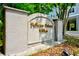 Community signage for 'Pelican Pointe Villas' along the roadside with manicured lawn and shrubbery at 1984 Folly Rd # B114, Charleston, SC 29412