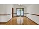 Elegant dining room featuring gleaming hardwood floors, natural light, and neutral walls at 204 Knightsbridge, Charleston, SC 29418